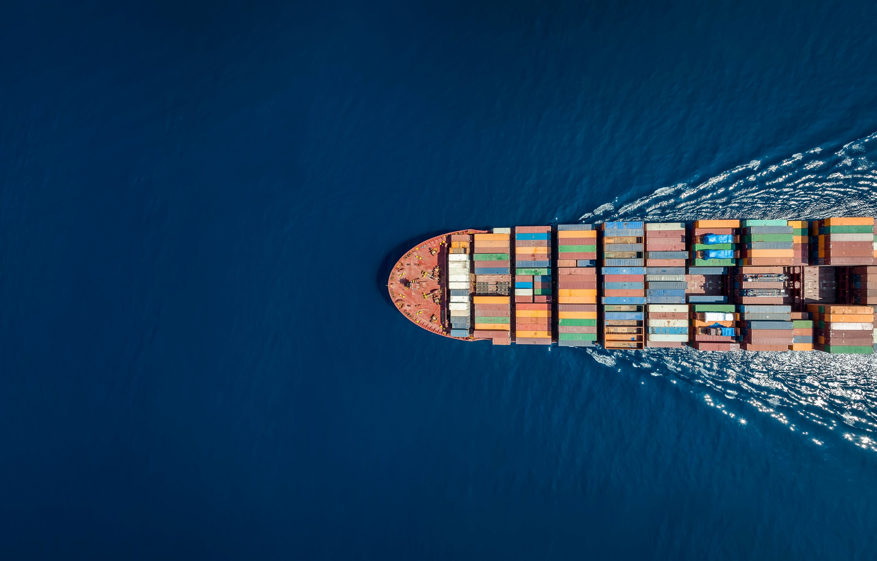 Containership travelling through the sea