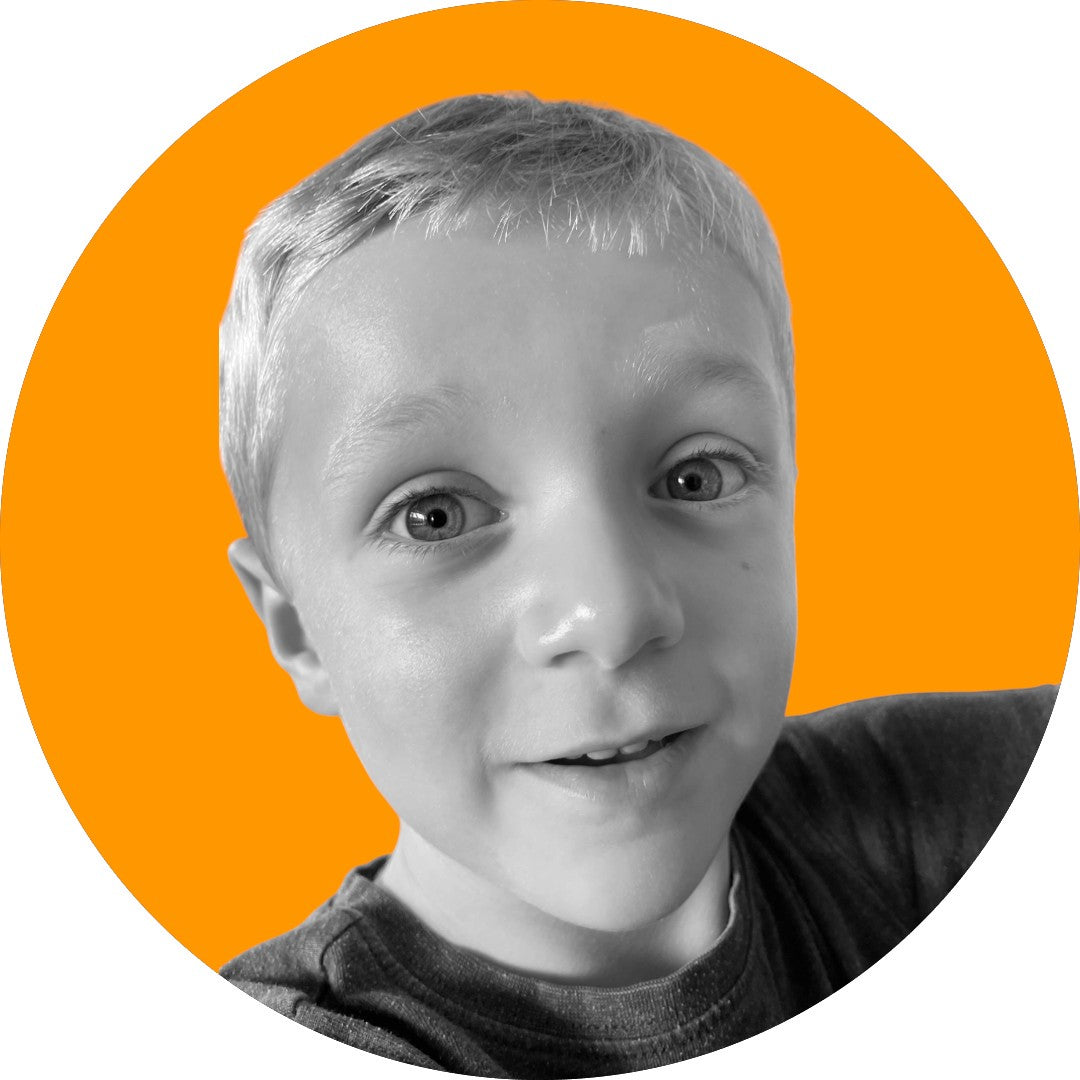 Photo of owner's son on orange background